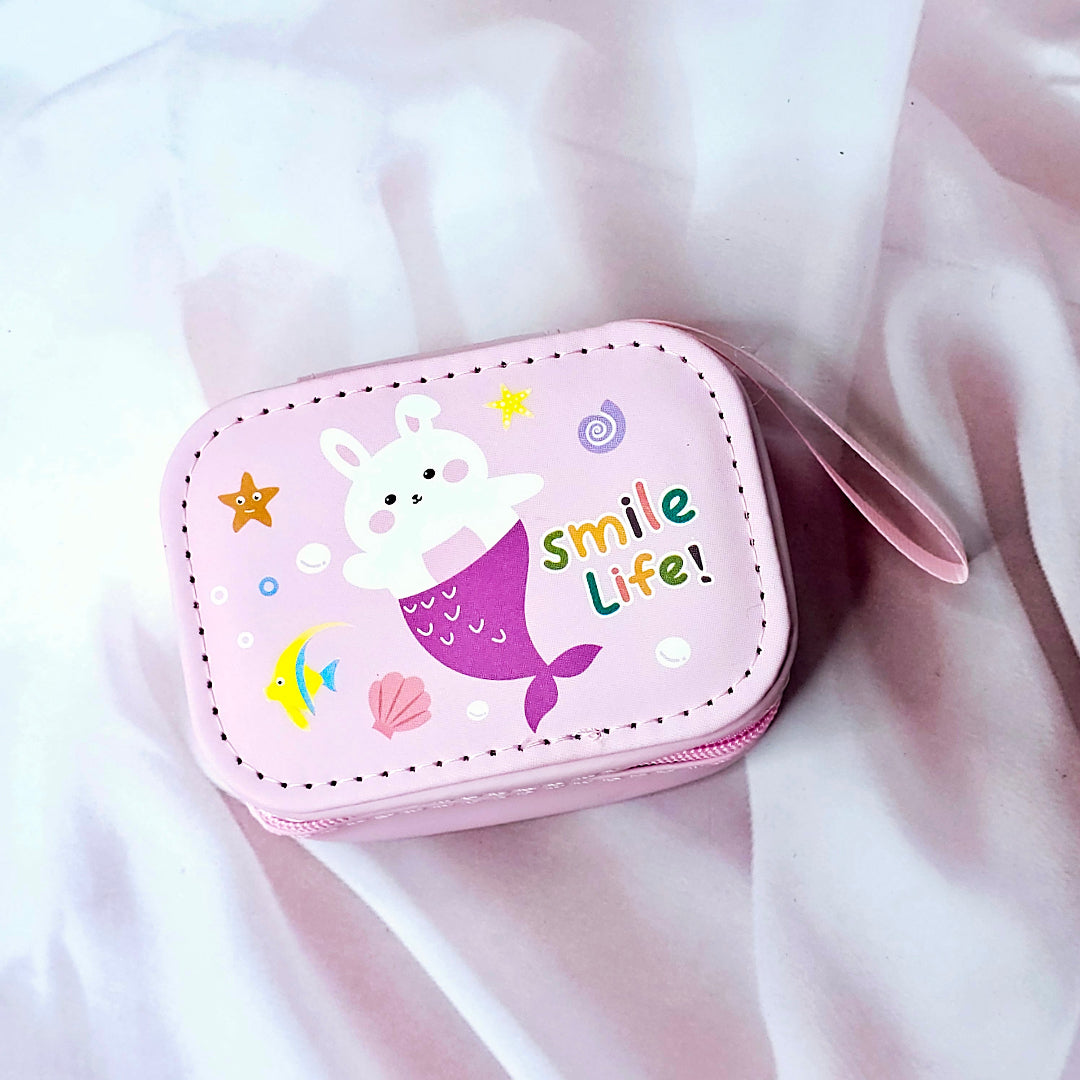 Various cartoon-themed small storage pouches for kids, featuring bunnies, chicks, and other fun designs. www.usmile.toys